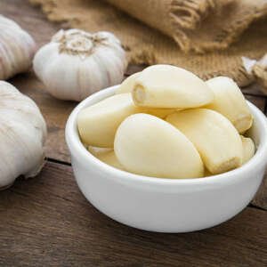 peeled garlic in bowl