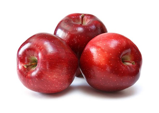red delicious apples over white background red delicious apples over white background